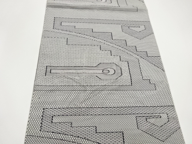  幾何学模様織出し名古屋帯